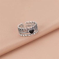 Melhill Adjustable Silver Ring with Black Heart - Sleek and Modern Design for Everyday Elegance